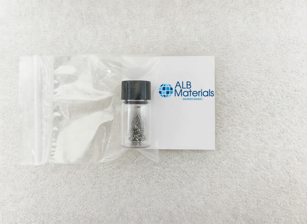 Close-up image showcasing the precision manufacturing of radiopaque marker bands for medical devices, highlighting fine machining, consistent dimensions, and high-quality metal components designed for reliable X-ray visibility in minimally invasive procedures.